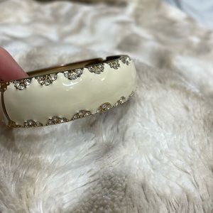 White/cream enamel bracelet with crystals.